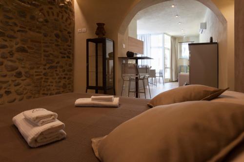 Posteľ alebo postele v izbe v ubytovaní La Bellavita Del Garda Luxury Apartments