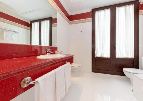 Un ou plusieurs lits dans un hébergement de l'établissement Hotel Soho Boutique Jerez