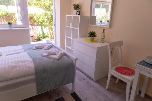 Katil atau katil-katil dalam bilik di Apartamenty Przystań