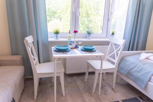 Katil atau katil-katil dalam bilik di Apartamenty Przystań