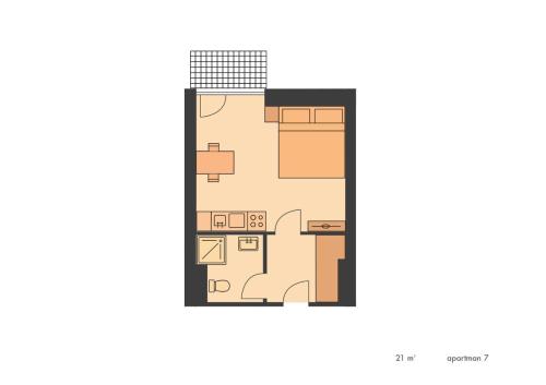 a floor plan of a house with furniture at Apartmány Gryf Harrachov in Harrachov