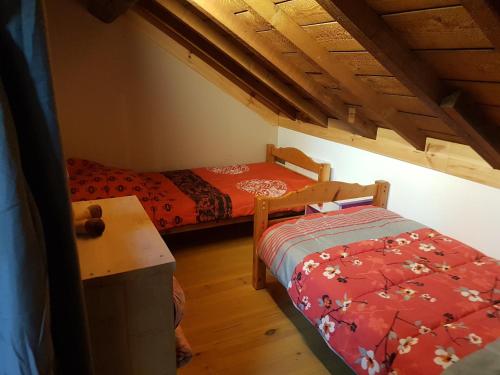Postel nebo postele na pokoji v ubytování spa et sauna