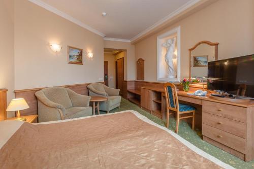 TV a/nebo společenská místnost v ubytování Hotel Polaris