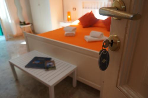 Postel nebo postele na pokoji v ubytování B&B Casa Laganà