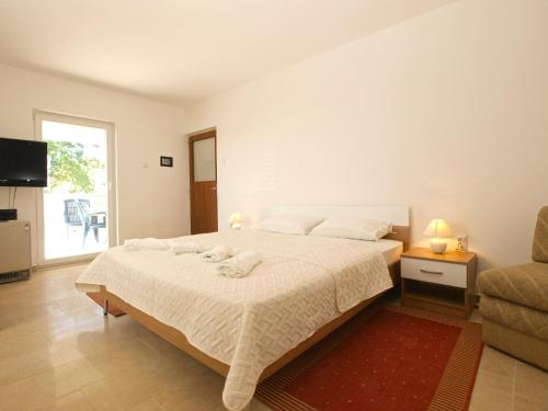 Postel nebo postele na pokoji v ubytování Apartment 1215