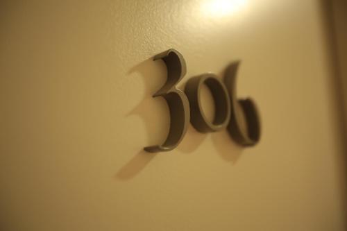 a door handle with the number on it at Hotel Jávea in Jávea