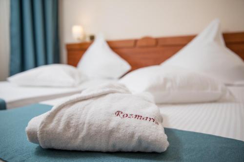Katil atau katil-katil dalam bilik di Hotel Rozmarin