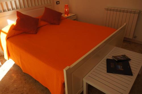 Postel nebo postele na pokoji v ubytování B&B Casa Laganà