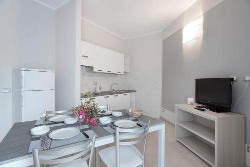 Dapur atau dapur kecil di Diano Sporting Apartments