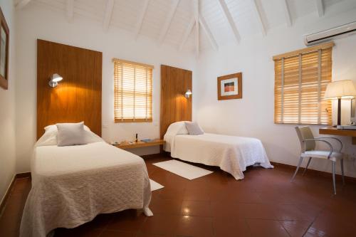 Letto o letti in una camera di Les Ilets De La Plage