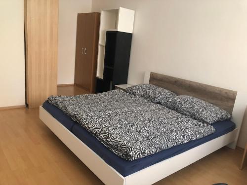 Posteľ alebo postele v izbe v ubytovaní Moonstreet apartments