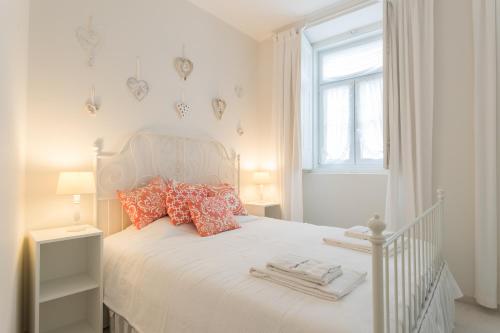 Ένα ή περισσότερα κρεβάτια σε δωμάτιο στο FLH Ericeira Charming House