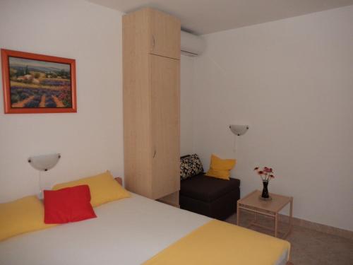 Postel nebo postele na pokoji v ubytování Jandric Apartments