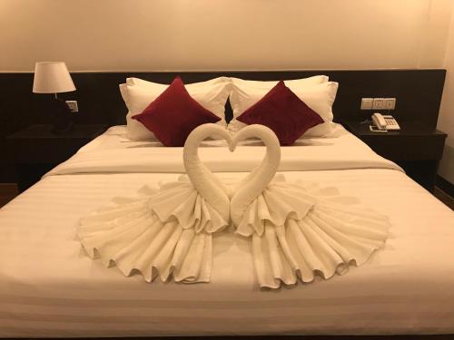 Cama o camas de una habitación en Apple Hotel Two - Near Phnom Penh Airport