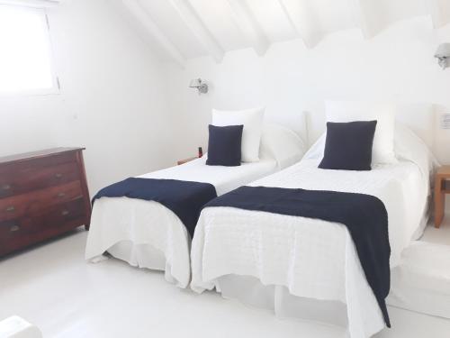 Letto o letti in una camera di Les Ilets De La Plage