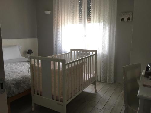A bed or beds in a room at La Terrazza sul Naviglio B&B