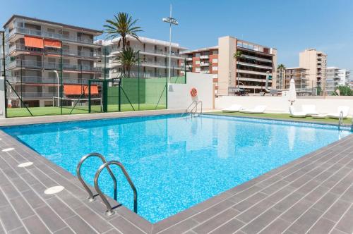 a swimming pool on the roof of a building at Ag Casa Del Mar Premium in Gandía