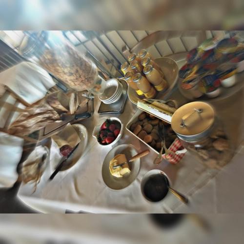 an overhead view of a table filled with food at Agriturismo Cascina Rosengana in Cocconato