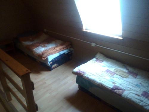 Postel nebo postele na pokoji v ubytování Ośrodek Wczasowy "GRONOSTAJ"