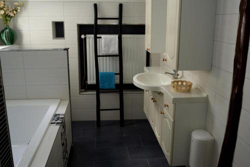 ห้องน้ำของ De Corylus Vakantie Appartement