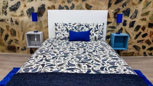 Ένα ή περισσότερα κρεβάτια σε δωμάτιο στο Casa do Arco Portalegre
