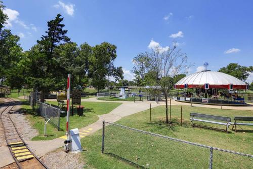 a park with benches and a pavilion with a playground at Super 8 by Wyndham Duncan in Duncan