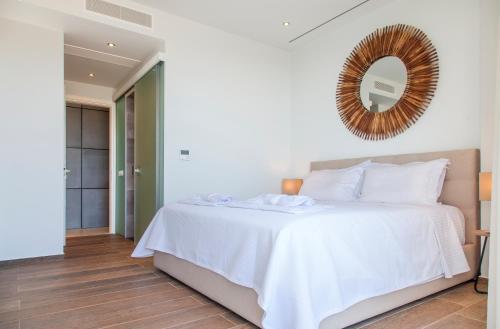Villa Luxe tesisinde bir odada yatak veya yataklar
