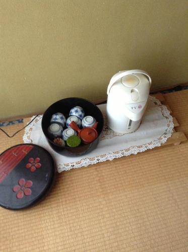 a table with a bowl of eggs and a blender at Miyasakaya in Nozawa Onsen