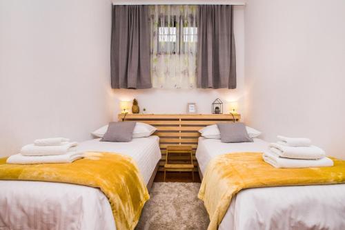 Ένα ή περισσότερα κρεβάτια σε δωμάτιο στο Zeleni kuk