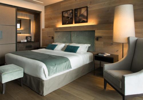 Postel nebo postele na pokoji v ubytování Filario Hotel & Residences