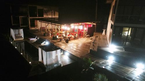an overhead view of a building at night with lights at Villa F&B in Bocas del Toro