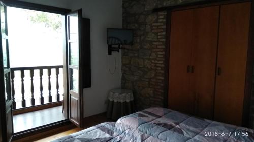 Ένα ή περισσότερα κρεβάτια σε δωμάτιο στο Casa Albertino