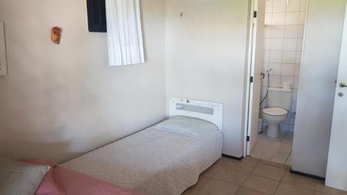 A bed or beds in a room at Aquaville Térreo - Porto das Dunas - CEARÁ - AV80101