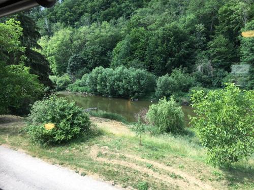 a river on the side of a road at CHATA Privlaky in Přívlaky