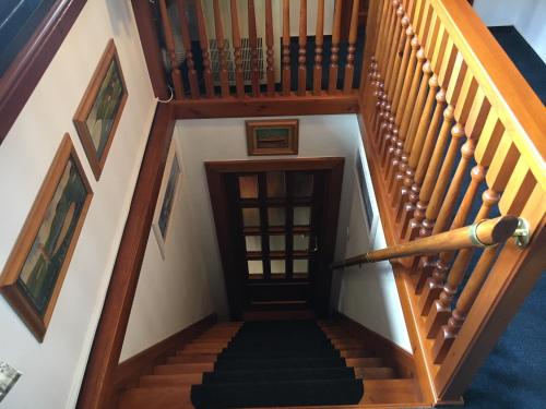 an overhead view of a staircase with wooden railings at CHATA Privlaky in Přívlaky