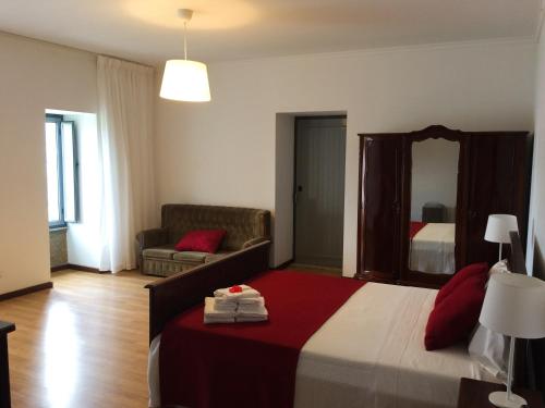 Postel nebo postele na pokoji v ubytování Quinta de Catapeixe Douro River