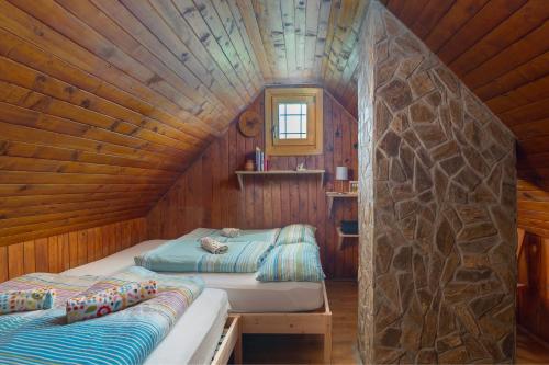 Tempat tidur dalam kamar di Chalet Gorenjka - Velika planina