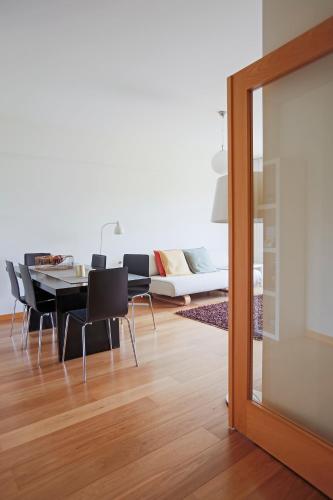 a dining room with a table and chairs at Casa Gil in Lisbon