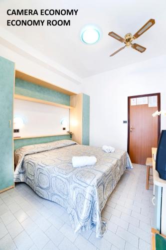 Cama o camas de una habitación en Mantovani Hotel Murano & Mariù