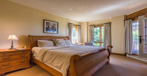 Cama o camas de una habitación en L'Équinoxe Rendez-Vous Mont-Tremblant