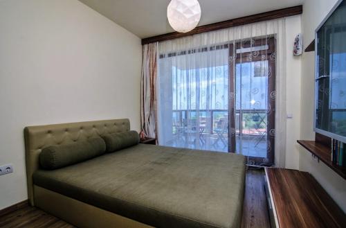 Postel nebo postele na pokoji v ubytování Apartment Balchik