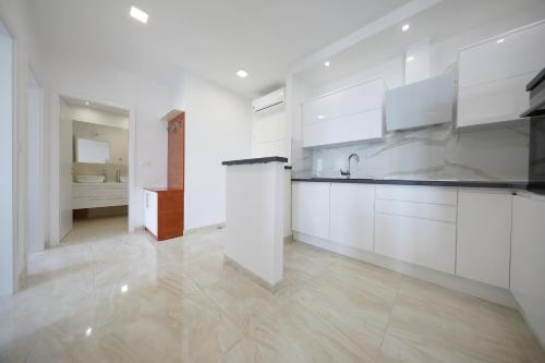 Kuchyňa alebo kuchynka v ubytovaní Apartmani Postimana