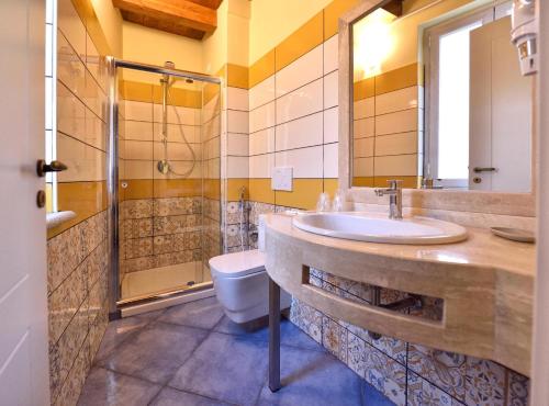 Een badkamer bij Residenza Vinci Room & Suite