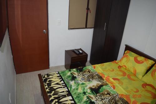Hotel Acuariusにあるベッド