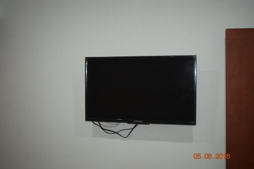 Hotel Acuariusにあるテレビまたはエンターテインメントセンター