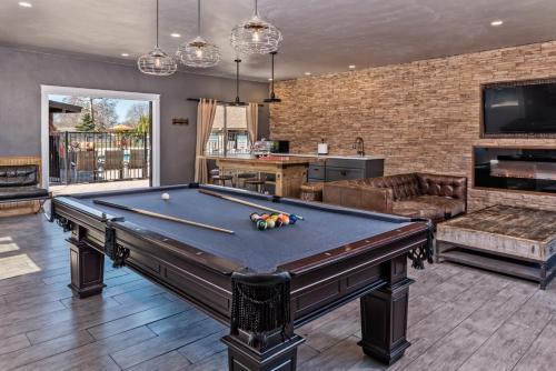 a pool table in a living room with at Flying Flags RV Resort & Campground in Buellton