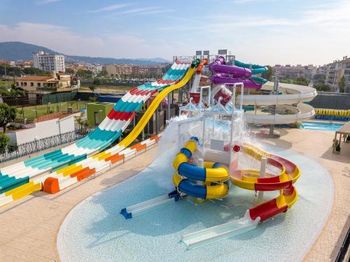 a large water park with a water slide at Golden Taurus Aquapark Resort in Pineda de Mar
