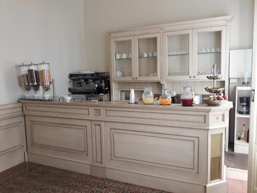 a large kitchen with a large counter with fruits on it at Umberto House Catania in Catania