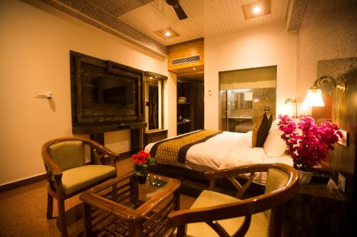 Un lugar para sentarse en Hotel Kings Regency