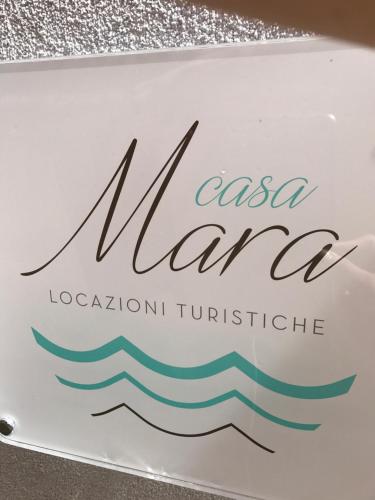 a sign for a mercedes benz car at Casa Mara in Chioggia